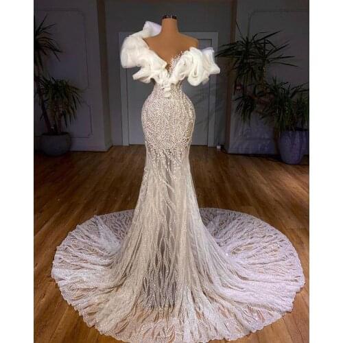 Luxury Pearls Mermaid 2021 Wedding Dresses Bridal Gowns Lace Appliqued Beaded Crystal Sweep Train Robe de mariée