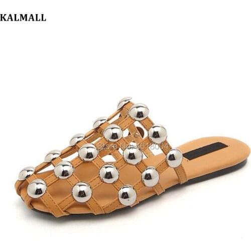 KALMALL Amelia Casual Flat Sandals Women Cages Slides Rivets Studded Gladiator Mules Slip On Casual Slippers Fashion Runway