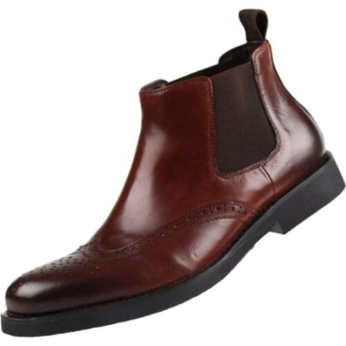 Mens leather boots, high-top shoes, carved round head, made of cowhide. Gamonelli. Keep warm
