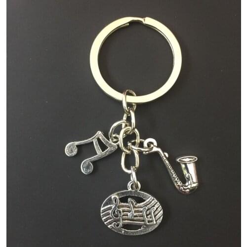 1PCS keychain new popular and interesting handmade personality with musical notes/piano/guitar/microphone/metal keychain