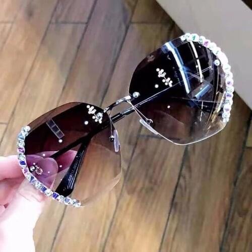 Diamond bling sunglasses women uv400 2021 trendy rhinestone crystal sun glasses frameless oversized oculos de sol feminino