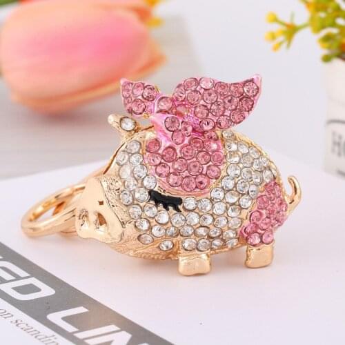 Factory direct cute piggy alloy keychain girl bag car key ring jewelry pendant