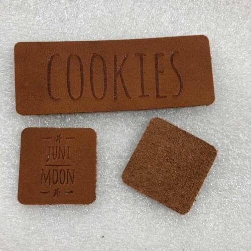 Custom real leather labels for jeans, bags, clothes ,real leather label , leather label, label ,debossed/engraved logo