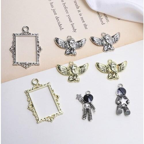 10pcs Retro style oil painting frame little angel astronaut Earrings For Women alloy niche pendant jewelry necklace accessories