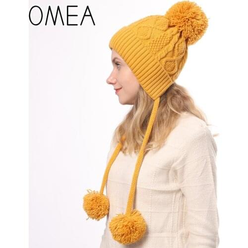 OMEA Winter Hat Twist Floral Beanie for Ladies Pompom Hat Earflaps Knitted Women Hat Gift Skis Shose Women Cashmere Pompoms Cap