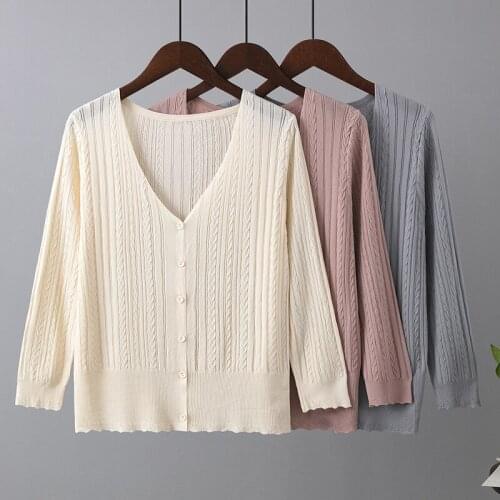 Knit sweater women thin cardigan ice silk top three-quarter sleeves 2021 summer new twist v-neck loose sunscreen shirt sold tops