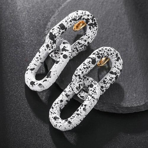 Fashion Geometric Oval Polka Dot Clip Earrings for Womens Personality Exaggerated Black and White Dali Pattern Inkjet Earrings