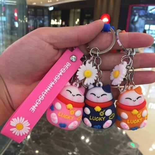 New Korean creative key chain zhaocaimao car doll pendant lovers key chain super cute schoolbag Pendant