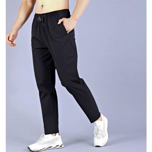 4XL Casual Pants Men Fitness Sportswear Tracksuit Bottoms Skinny Sweatpants For Men Trousers Gyms Jogger Track Pants Men Joggers