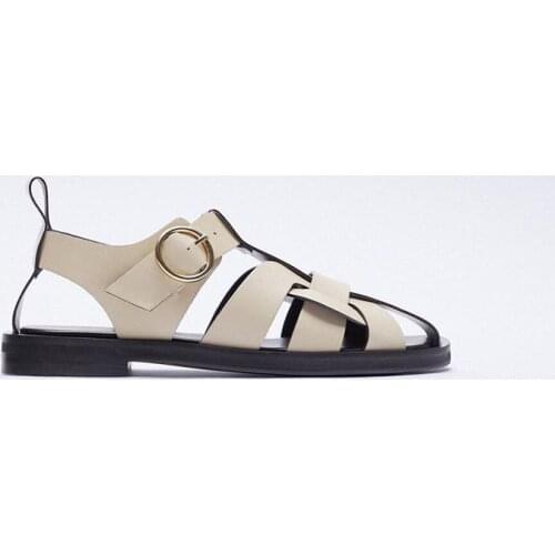 QUNSHENGRUI New round head backpack flat open hollow lady sandals Roman style cool black street fashion women sandals