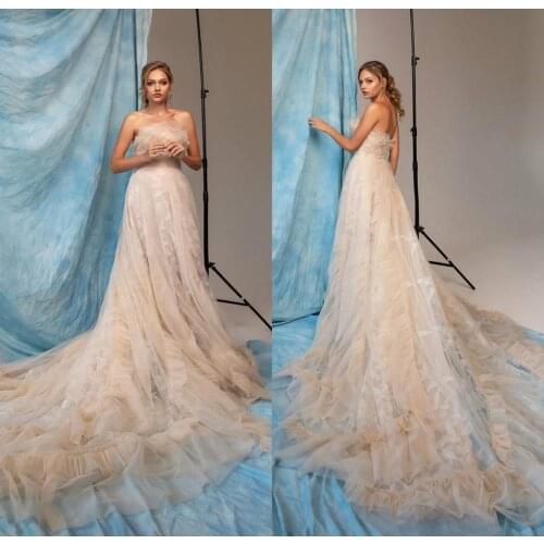 2020 Bohemian Wedding Dresses Sweetheart Sleeveless Lace Appliques Bridal Gowns Backless Sweep Train A Line Wedding Dress
