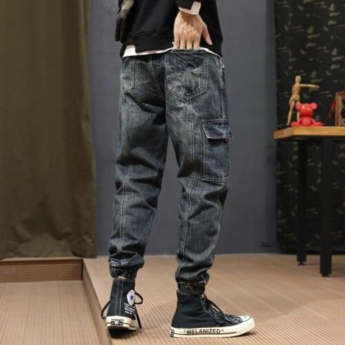 2021 New Fashion Streetwear Retro Wash Loose Fit Spliced Designer Harem Pants Big Pocket Cargo Pants Hip Hop Jeans Men Joggers