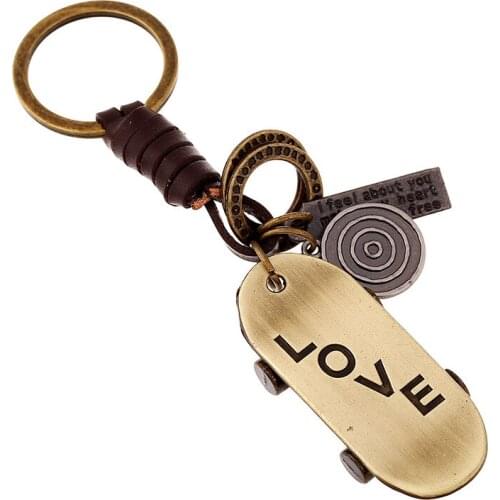 Lovers retro woven cowhide keychain creative scooter pendant car accessories bag pendant car keychain