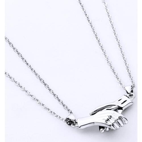 2Pcs / Set New Couple Magnet Attracts Hold Hands Clavicle Chain Necklaces Set For Women Men Pendant Choker Jewelry Gifts