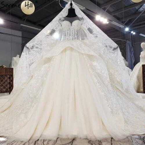 Ivory Long Sleeve Lace Up Wedding Dresses 2020 Dubai Sparkle Beading O-Neck Bridal Gowns HX0203 Custom Made