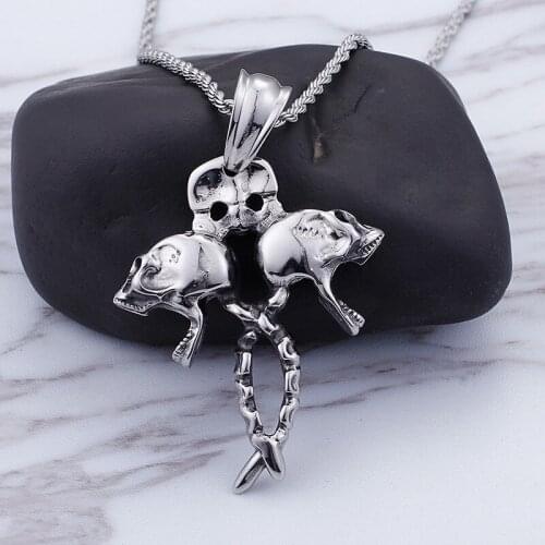 Selling mens stainless steel skull cross three skull cross titanium steel pendants
