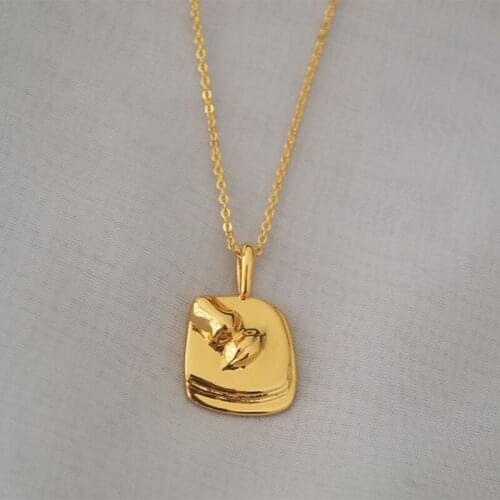 Korean version of the creative three-dimensional face sculpture irregular square pendant fashion temperament necklace woman