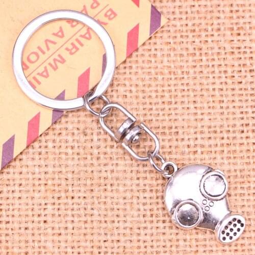 New Fashion Keychain 28x19mm gas mask steampunk Pendants DIY Men Jewelry Car Key Chain Ring Holder Souvenir For Gift