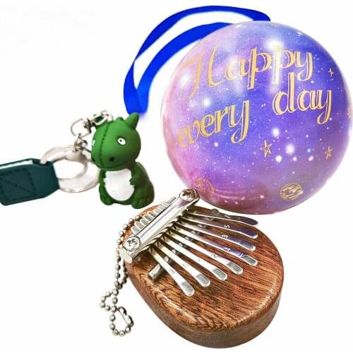 Mini thumb piano key chain kalimba keyring couple gift dinosaur ball decorations men and women portable piano backpack Pendant