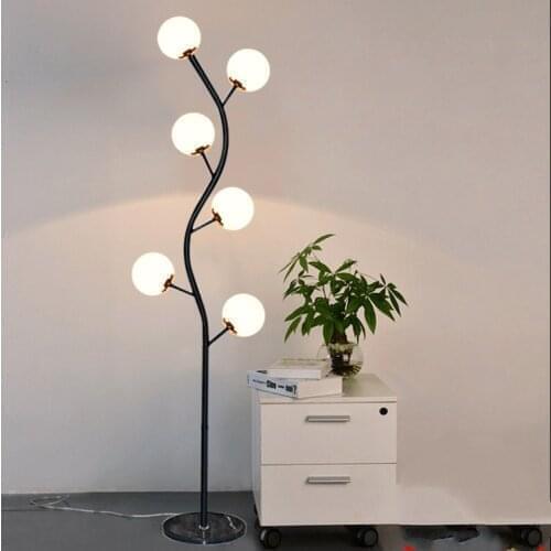 Modern simple glass ball floor lamp living room bedroom bedside lamp modern creative personality LED eye protection floor lamp