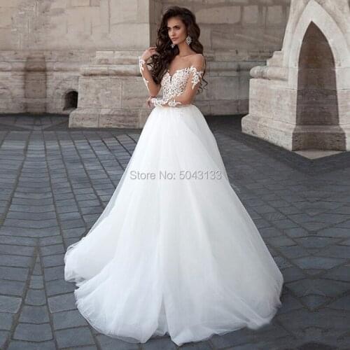 Elegant Tulle Ball Gowns Long Sleeves Wedding Dresses with Appliques 2020 Sexy Backless Floor Length Bridal Gown White Formal