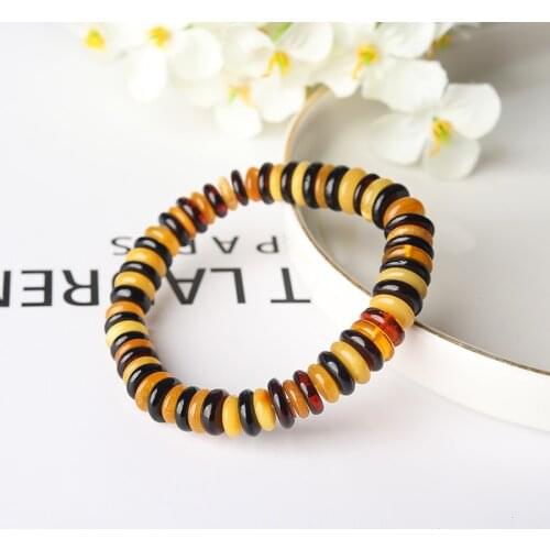 Baltic natural flower amber gold brown amber old beeswax bracelet female chicken butter topaz amber round bead single ring brace