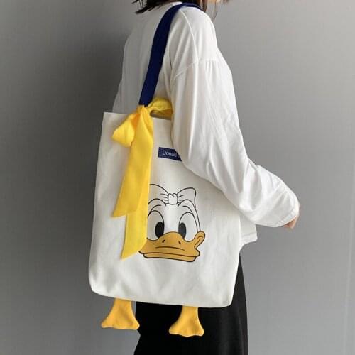 Disney cartoon Donald Duck bag girl new trendy ins cute student large capacity canvas shoulder bag