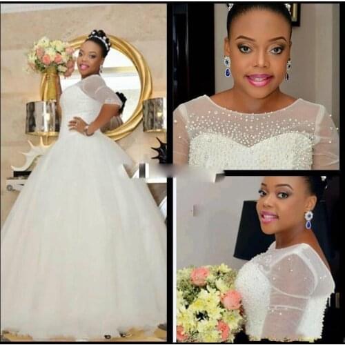 Charming A-Line Scoop Neckline Pearls Wedding Dresses Tulle Long Half Sleeves African Bridal Gowns 2021