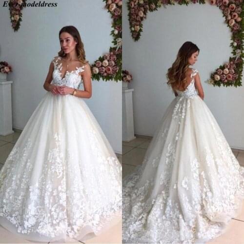 Elegant Lace Wedding Dresses 2019 Appliques Sheer O-Neck Cap Sleeves Zipper Back Sweep Train Bride Dresses Robe De Mariage