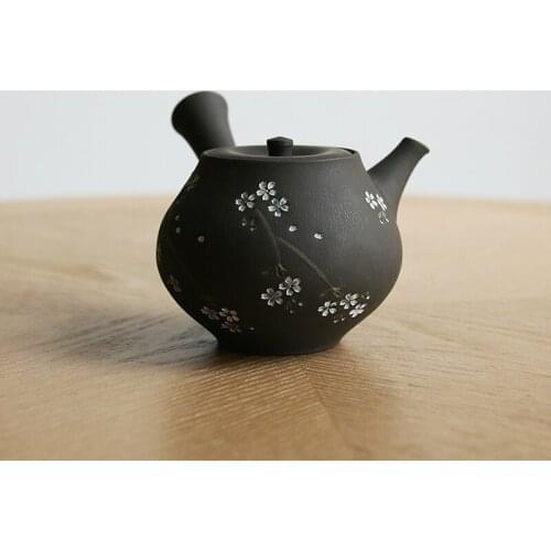 The qingfeng-xiangguang fracture sakura hand carved black mud horizontal lasts a Japanese side put pot of handmade tea