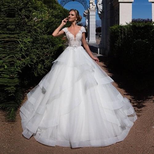 YIWUMENSA Tiered Puffy Tulle A Line Wedding Gowns Formal Lace Appliques Nude O Neck Illusion Buttons Bridal Dresses Women Bride