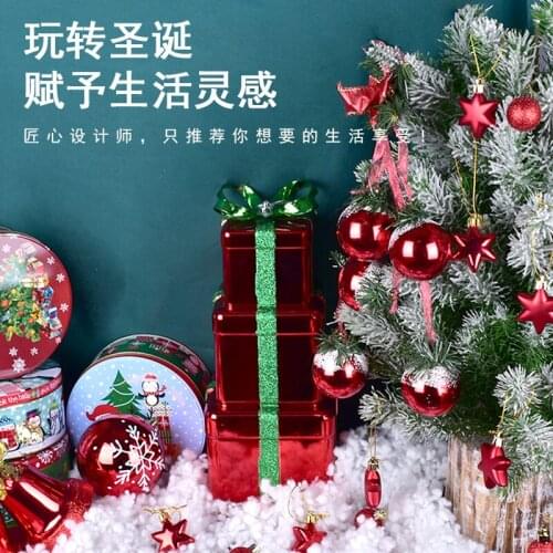 Christmas decorations red gift box ball string star ornaments tree scene layout