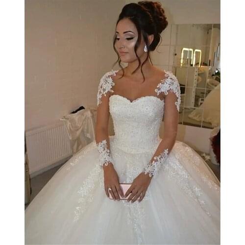 Illusive Lace Appliqued Ball Gown Wedding Dress Sheer Long Sleeve Bridal Gown