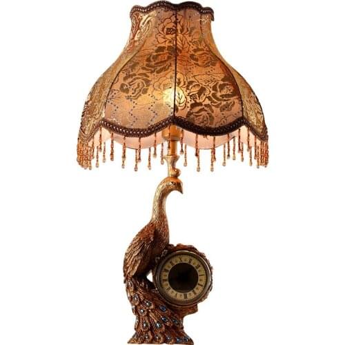 European modern clock table lamp one American living room table lamp bedroom bedside table LED lamp engraving craft table lights