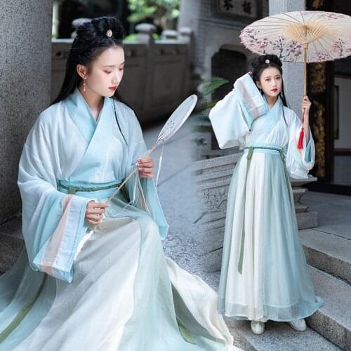 Free shipping Han style gold silk cross collar large sleeve shirt womens dress one piece weaving large swing skirt fairy skirt