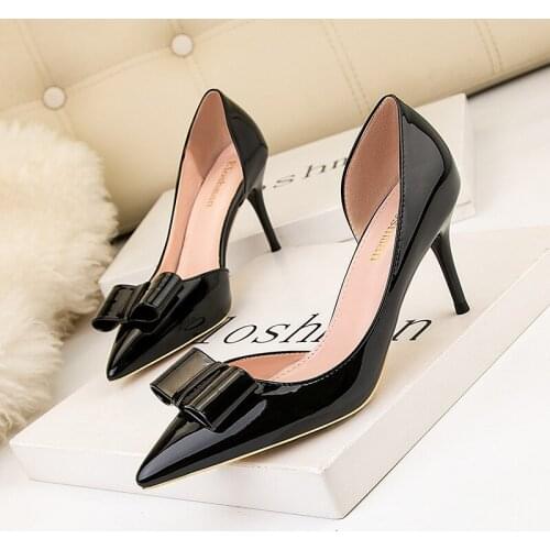 Fashionable high-heeled patent leather pointed pointed hollow sexy slim bowknot high-heeled shoes women