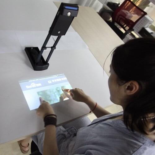 Portable interactive wifi multimedia projector, laser image calibration technology