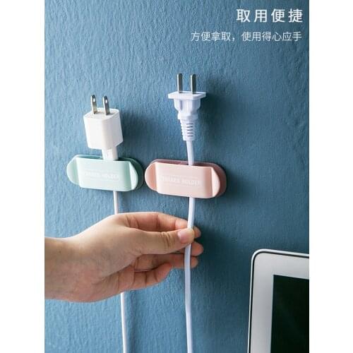 Household multifunctional creative plug hook power cord storage socket wall-mounted kitchen free punch holder clamp