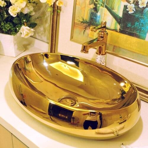 Bathroom art wash basin Oval Gold color Bathroom Cloakroom Ceramic Sinks Counter Top Wash Basin Bathroom Sink Washing basins