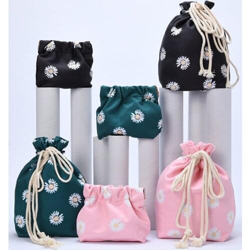 New ins small daisy storage bag clip shrapnel cosmetic storage bag bag lazy cosmetic bag drawstring