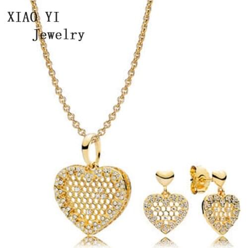 XIAOYI New 11Spring Shine charm golden honeycomb heart hollow earrings and necklace wedding jewelry popular fashion female