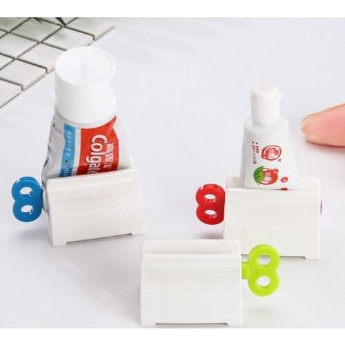 1PC Plastic Rolling Toothpaste Tube Squeezer Dispenser Holder Sucker Hanger Saves Toothpaste Cream Paint Bathroom Accessories