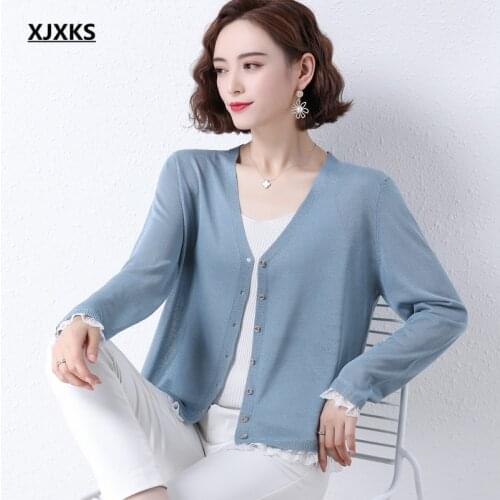 XJXKS 2021 summer new fashion hollow women sun protection clothing high-quality knitted thin sweater women cardigan