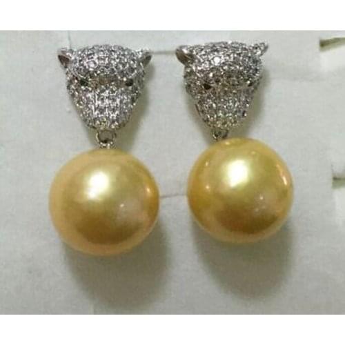 Charming huge 10-11 mm gold pearl dangle earring