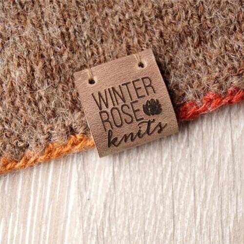 Center fold leather labels Custom folding labels Personalized logo labels Leather labels Branding tags Clothing labels Knitting