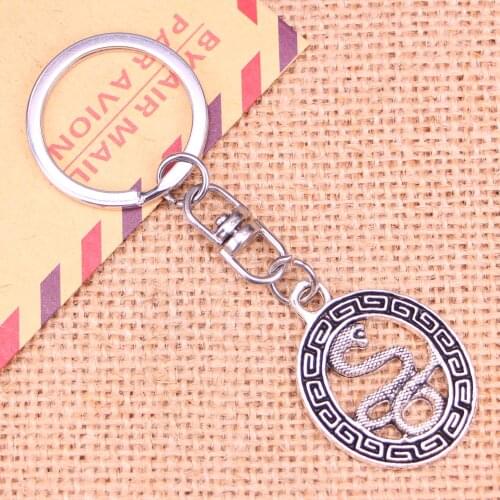 New Fashion Keychain 34*25 mm snake totems Pendants DIY Men Jewelry Car Key Chain Ring Holder Souvenir For Gift