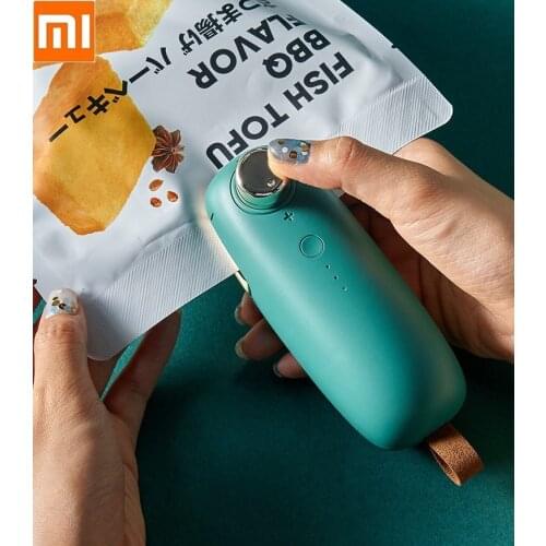 For New new USB charging Portable mini hand pressure sealing machine small snack packaging for household use Sealer