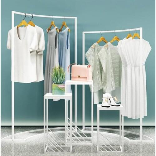 Clothing store Nakajima shelf womens clothing store middle horizontal bar simple high and low shelf window shoe bag table floor