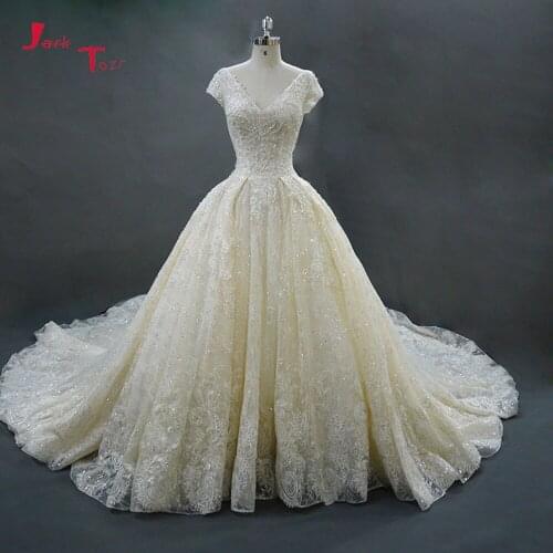 China V-neck Princess Ball Gown Wedding Dresses Cap Sleeve Robe de Mariee Sparkly Pearls Appliques Vestido de Noiva Plus Size