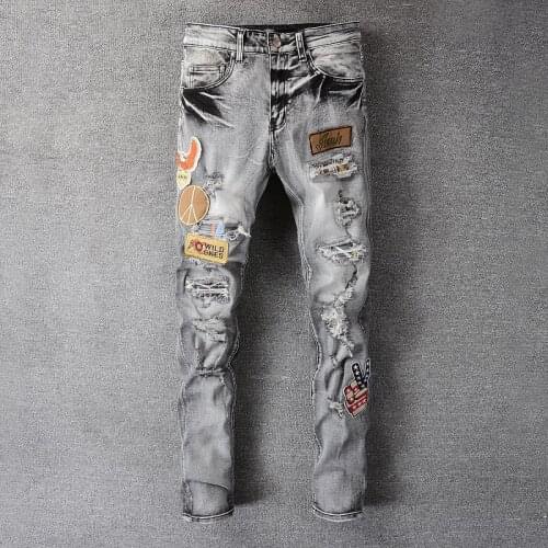 Trendy Mens Light-colored Jeans Ripped Stitching Pattern Patch Cloth Street Mens Motorcycle Pants Punk Denim Long Pants